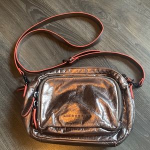 Liebeskind Berlin bronze cross body bag with orange details